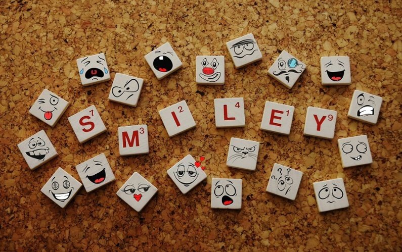 Various emoticons representing different moods, including a smiley face.